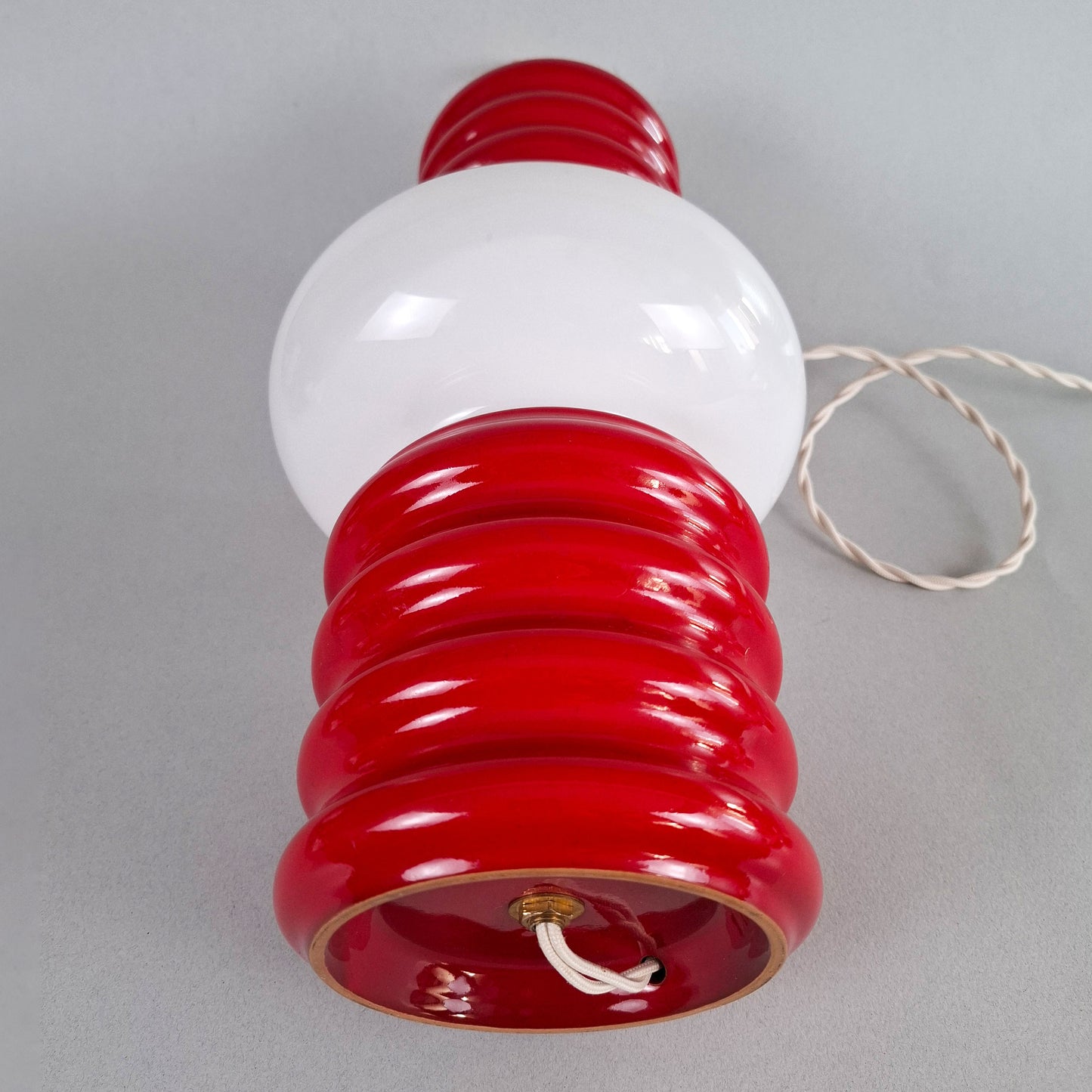 1970s red glazed ceramic table lamp with white opaline glass shade and brass accessories - Retro Lamp Shop