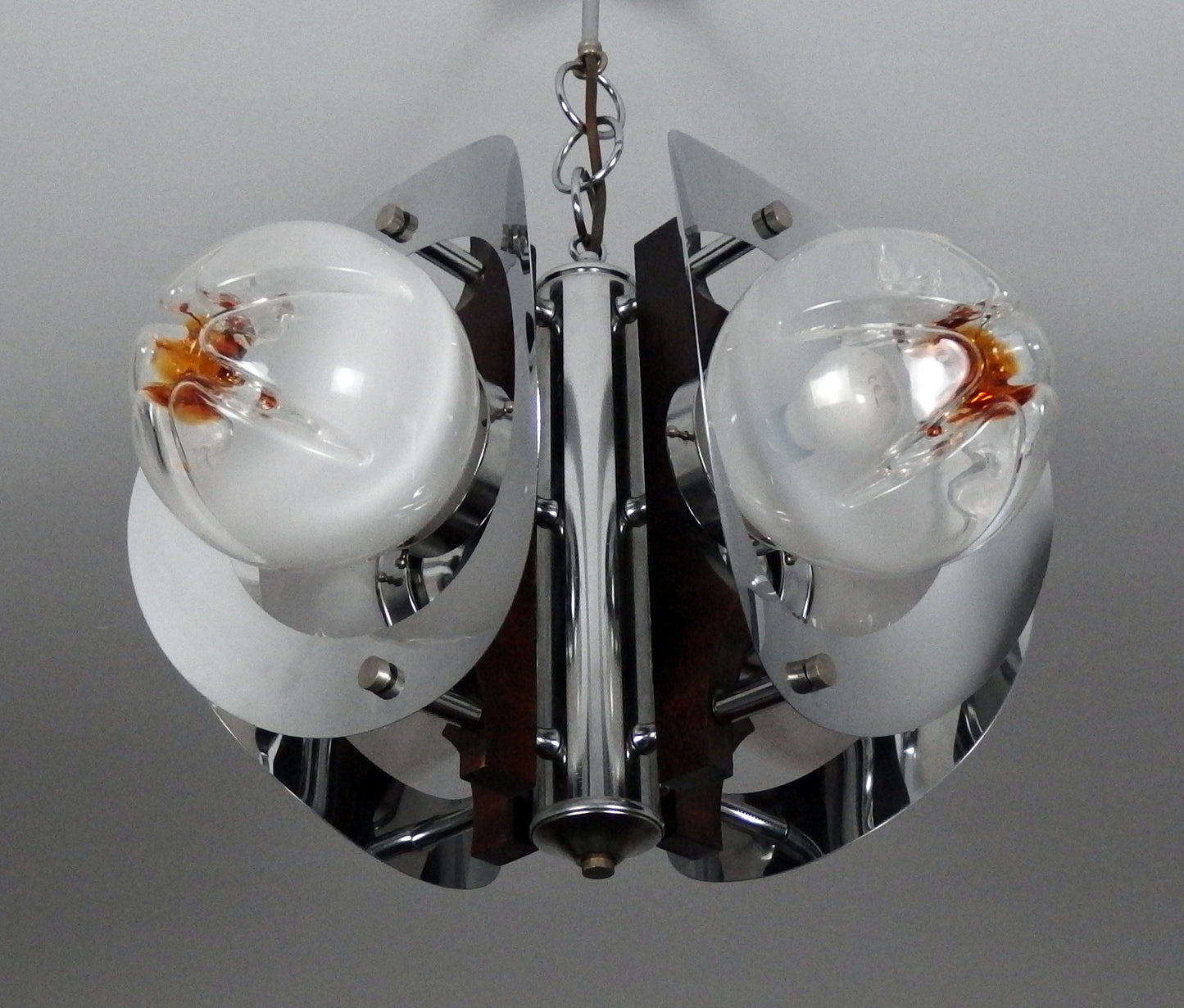70's Mazzega chandelier designed by Toni Zuccheri, chrome metal body with hand blown Murano glass and teak wood - Retro Lamp Shop
