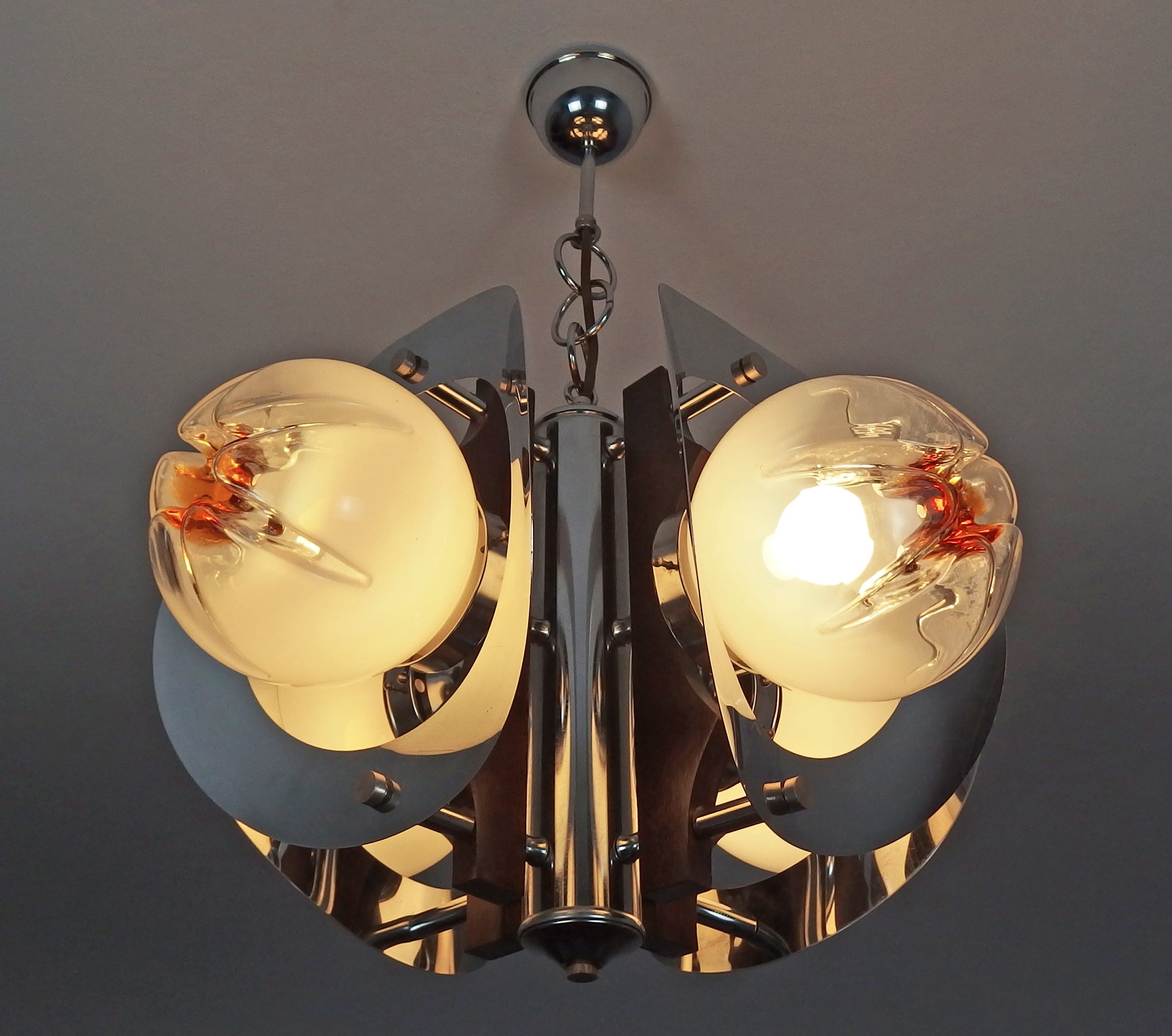 70's Mazzega chandelier designed by Toni Zuccheri, chrome metal body with hand blown Murano glass and teak wood - Retro Lamp Shop