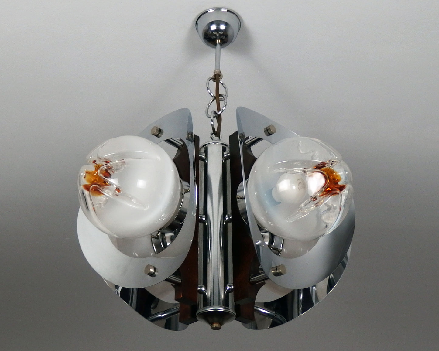 70's Mazzega chandelier designed by Toni Zuccheri, chrome metal body with hand blown Murano glass and teak wood - Retro Lamp Shop