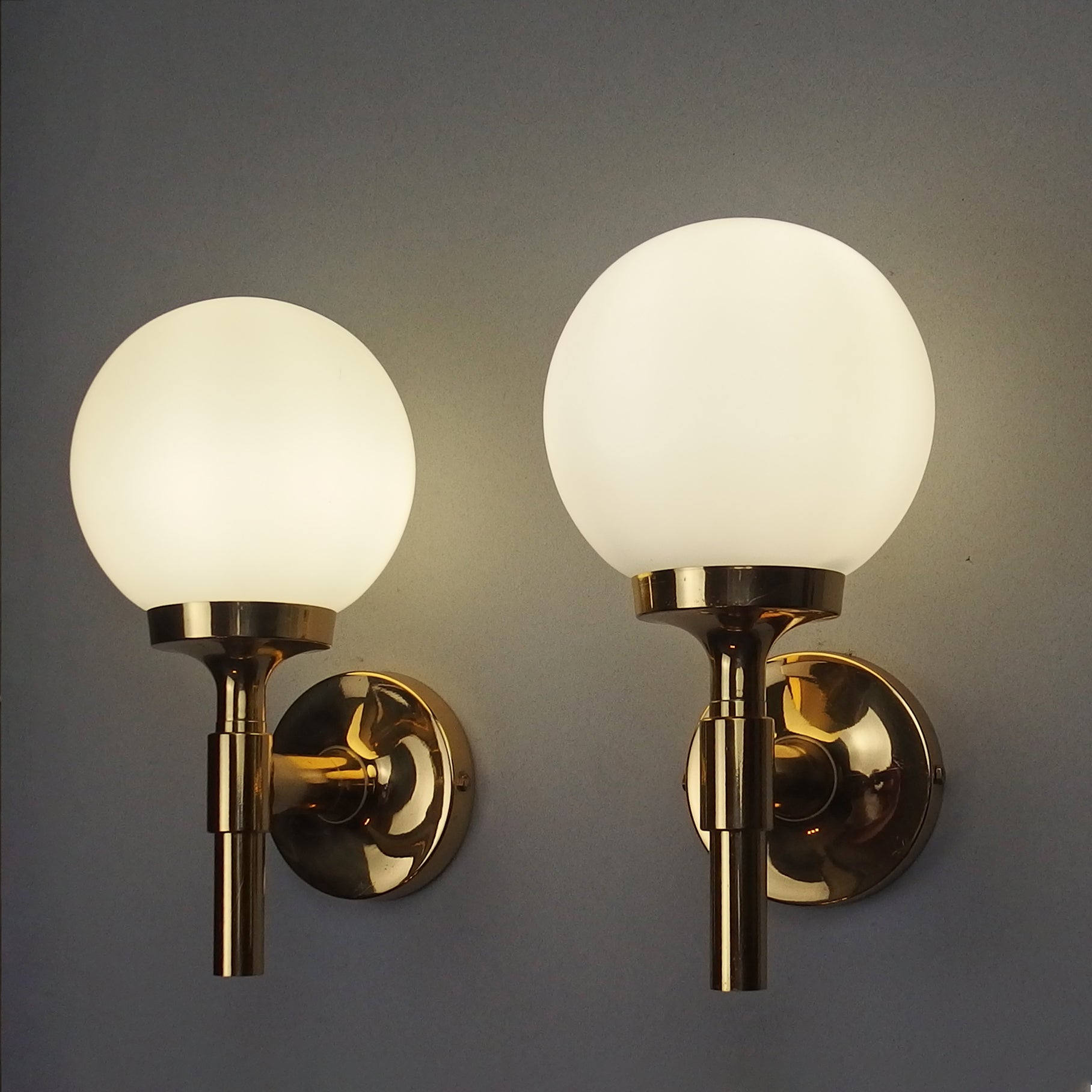Pair of 1970s polished brass sconces with frosted opaline glass globes - Retro Lamp Shop