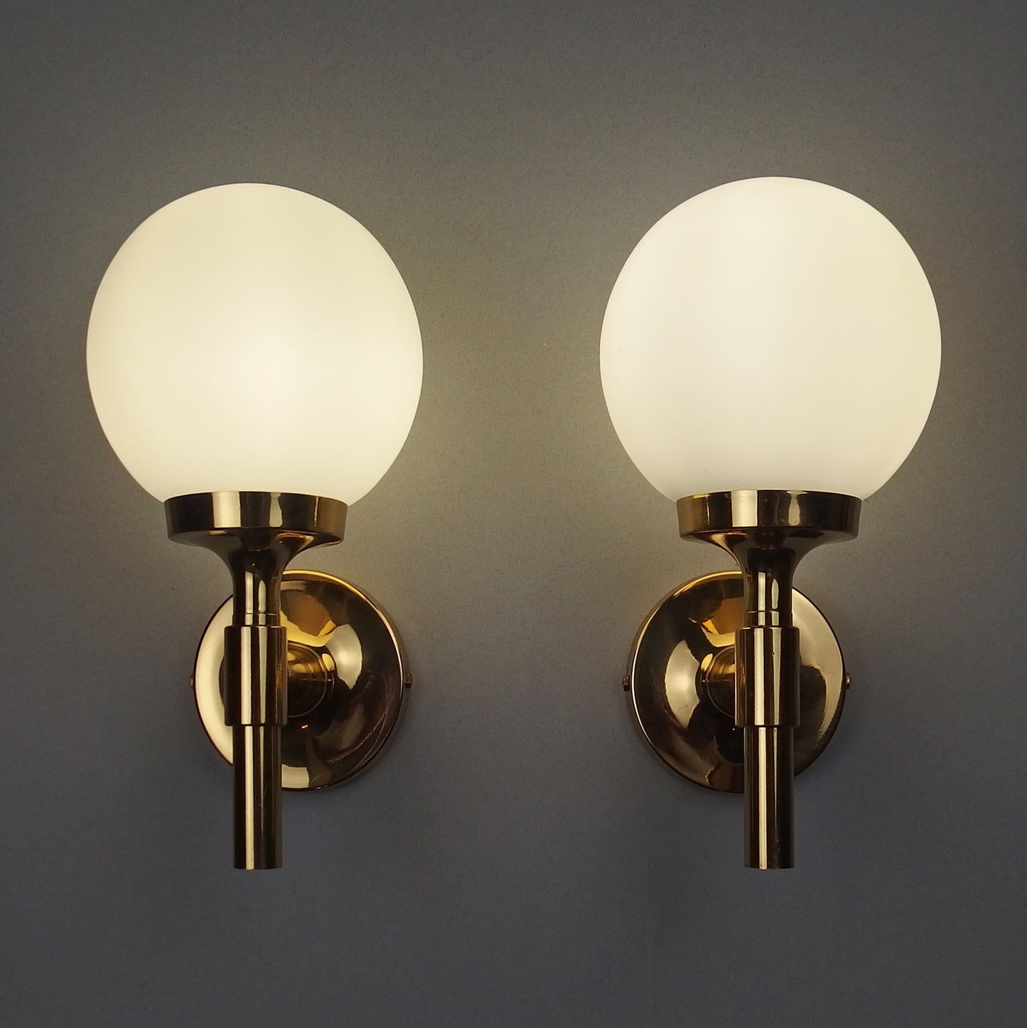 Pair of 1970s polished brass sconces with frosted opaline glass globes - Retro Lamp Shop