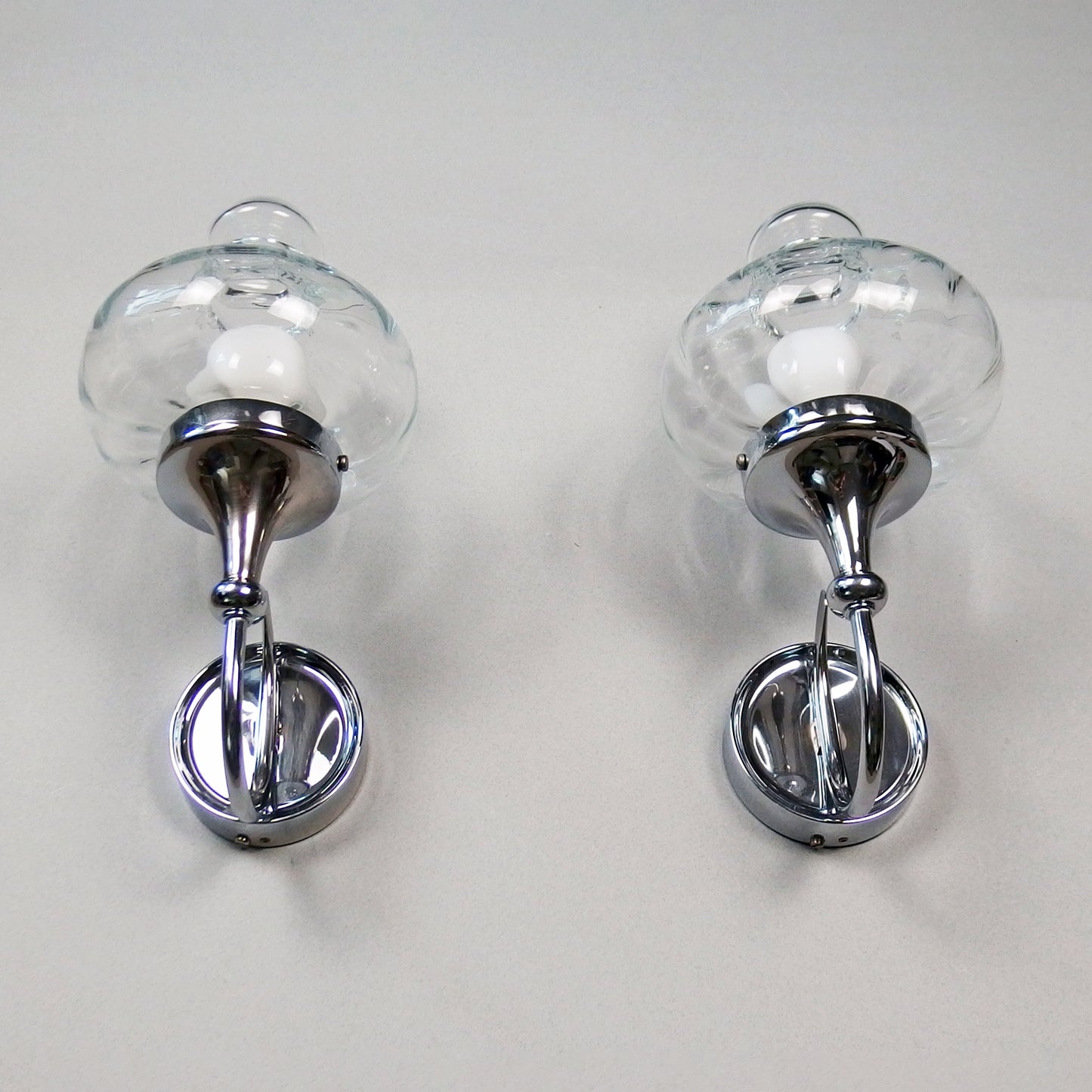 Beautiful pair of 1970s chrome and clear glass sconces from Willa - Retro Lamp Shop