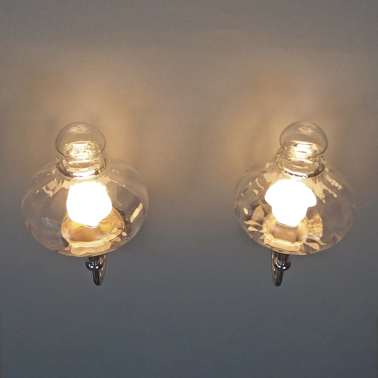 Beautiful pair of 1970s chrome and clear glass sconces from Willa - Retro Lamp Shop