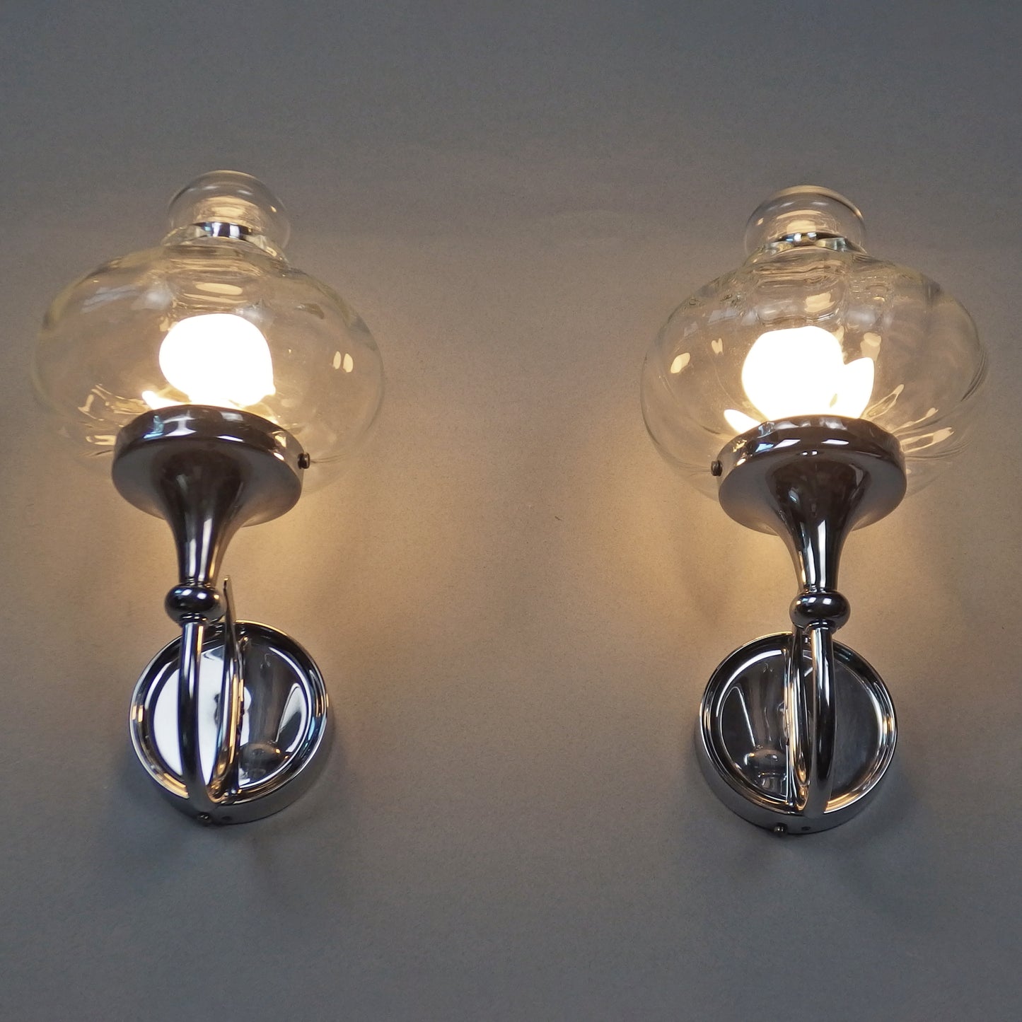 Beautiful pair of 1970s chrome and clear glass sconces from Willa - Retro Lamp Shop