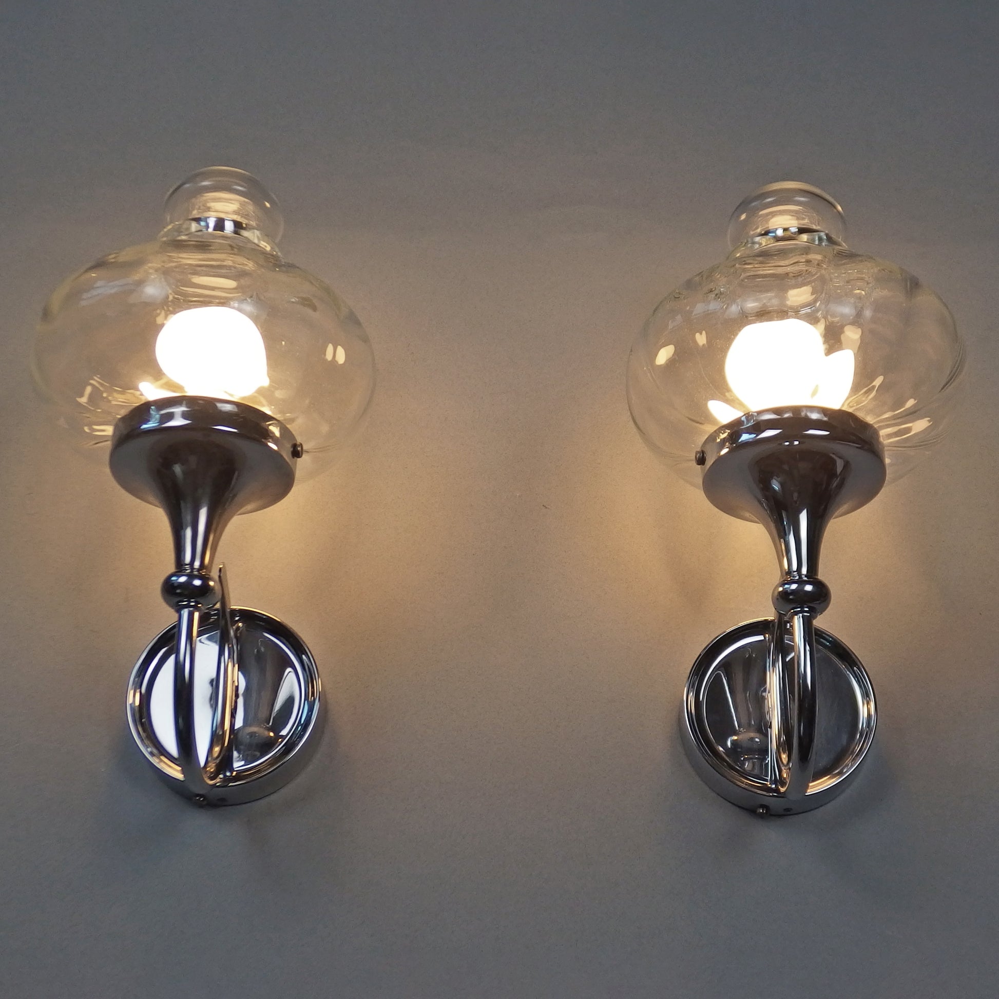Beautiful pair of 1970s chrome and clear glass sconces from Willa - Retro Lamp Shop