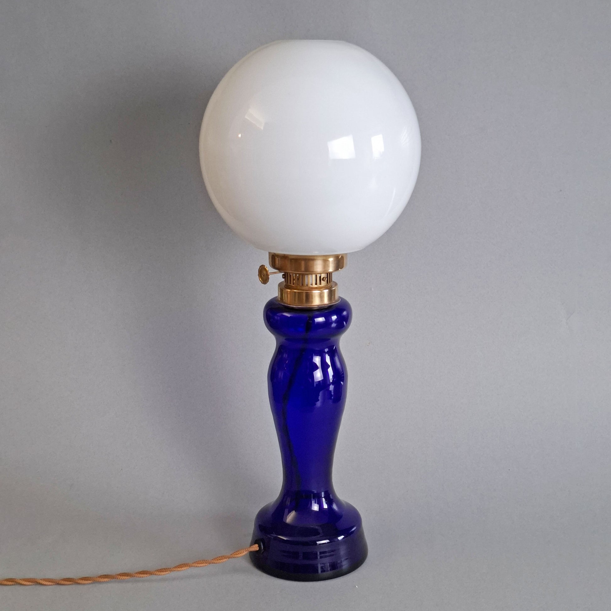 1970s glass vintage table lamp with cobalt blue foot and white opaline glass globe - Retro Lamp Shop