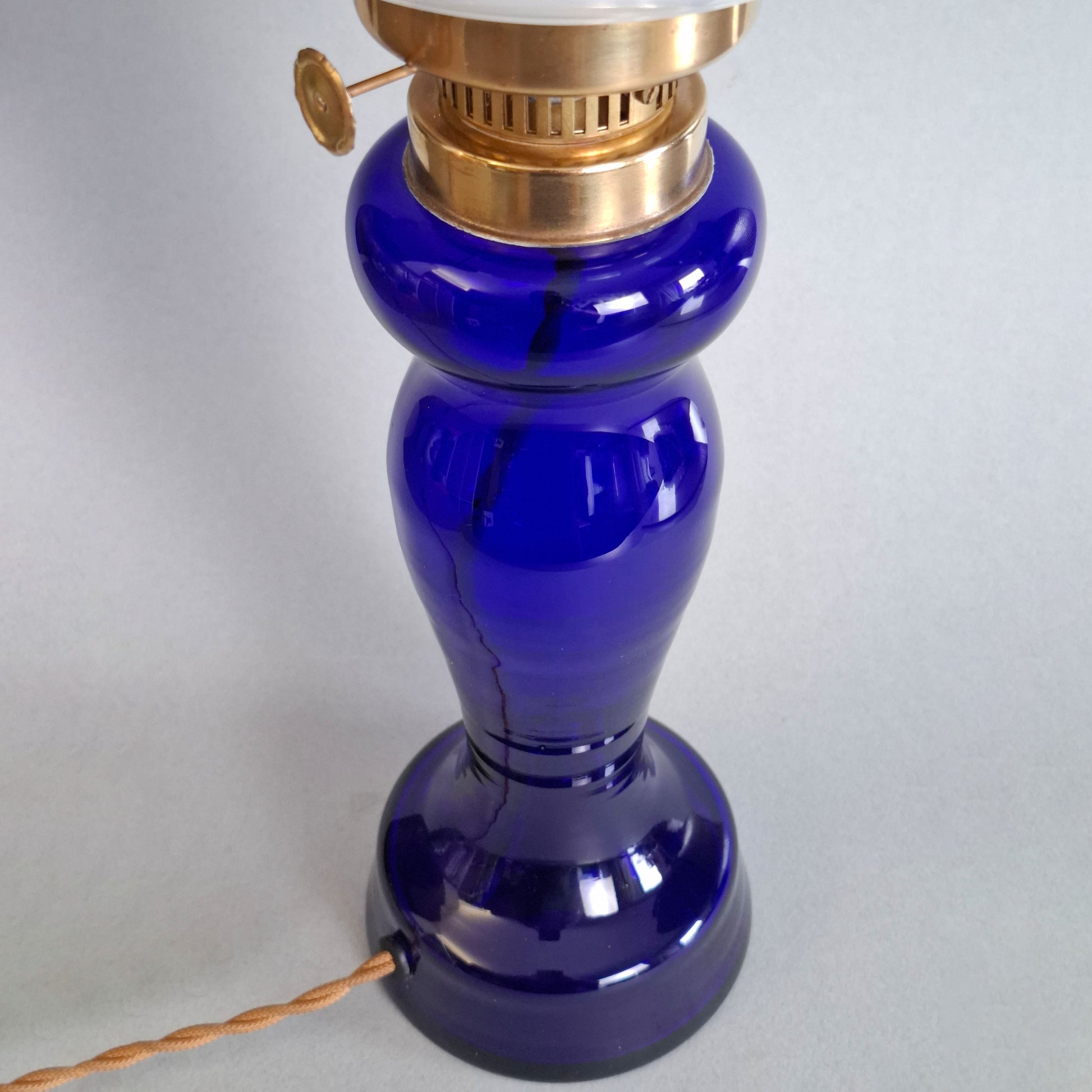 1970s glass vintage table lamp with cobalt blue foot and white opaline glass globe - Retro Lamp Shop