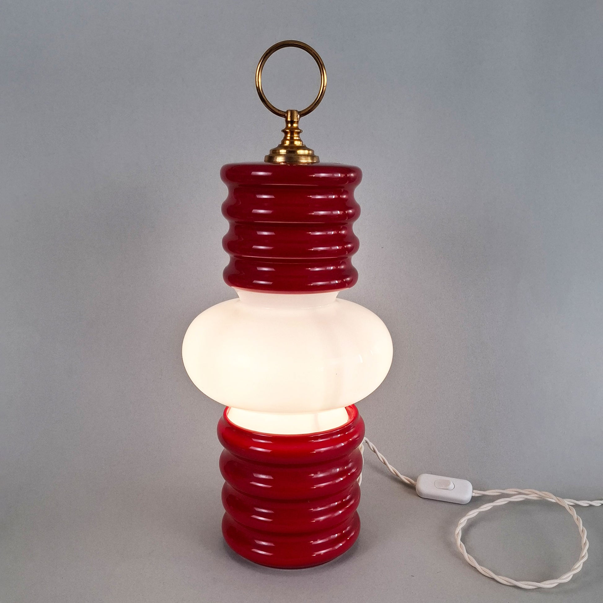 1970s red glazed ceramic table lamp with white opaline glass shade and brass accessories - Retro Lamp Shop