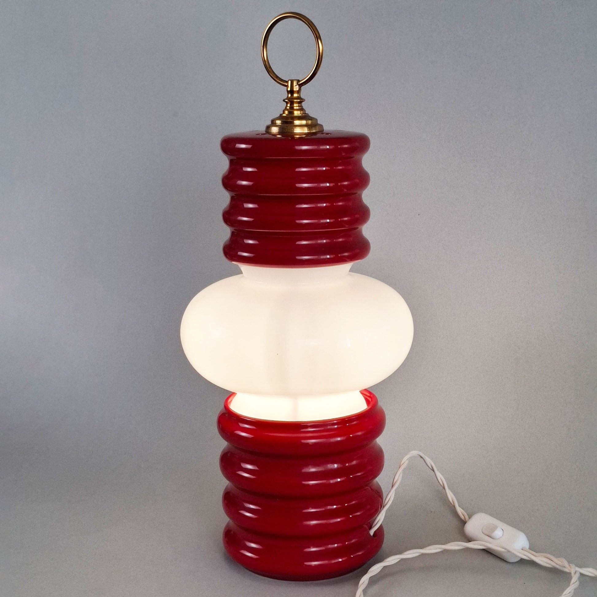 1970s red glazed ceramic table lamp with white opaline glass shade and brass accessories - Retro Lamp Shop