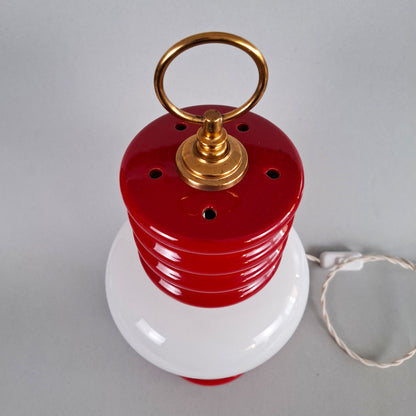 1970s red glazed ceramic table lamp with white opaline glass shade and brass accessories - Retro Lamp Shop