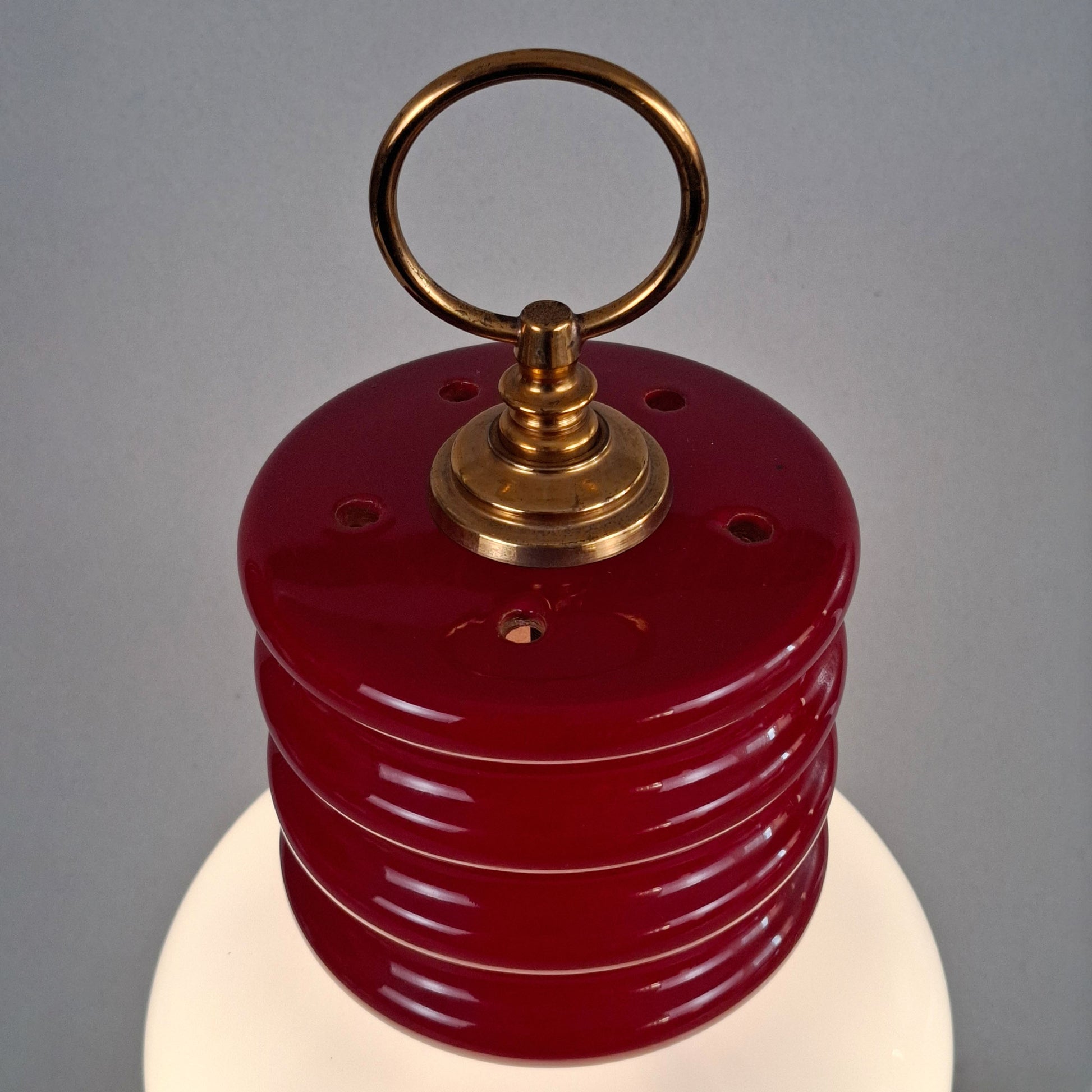 1970s red glazed ceramic table lamp with white opaline glass shade and brass accessories - Retro Lamp Shop