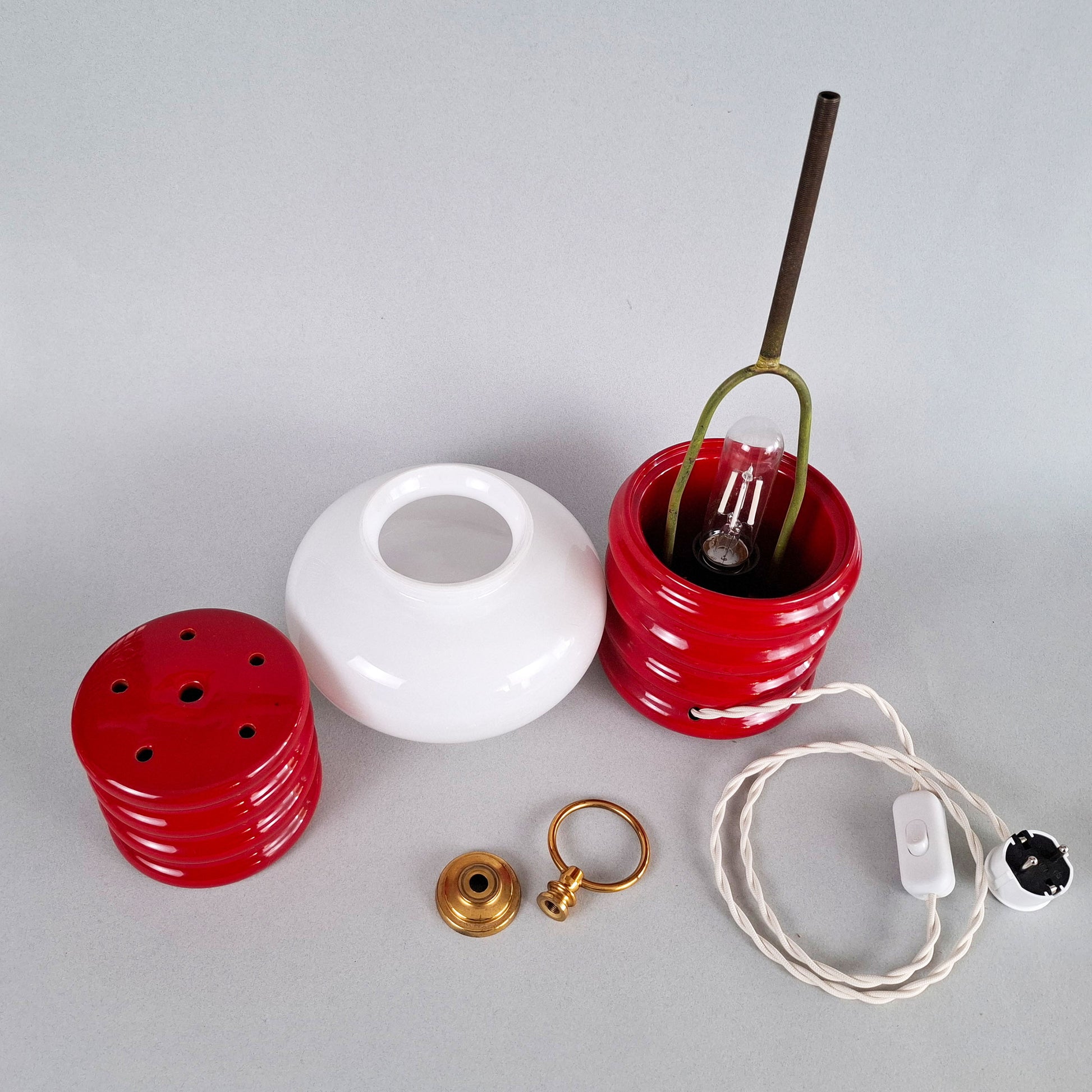 1970s red glazed ceramic table lamp with white opaline glass shade and brass accessories - Retro Lamp Shop