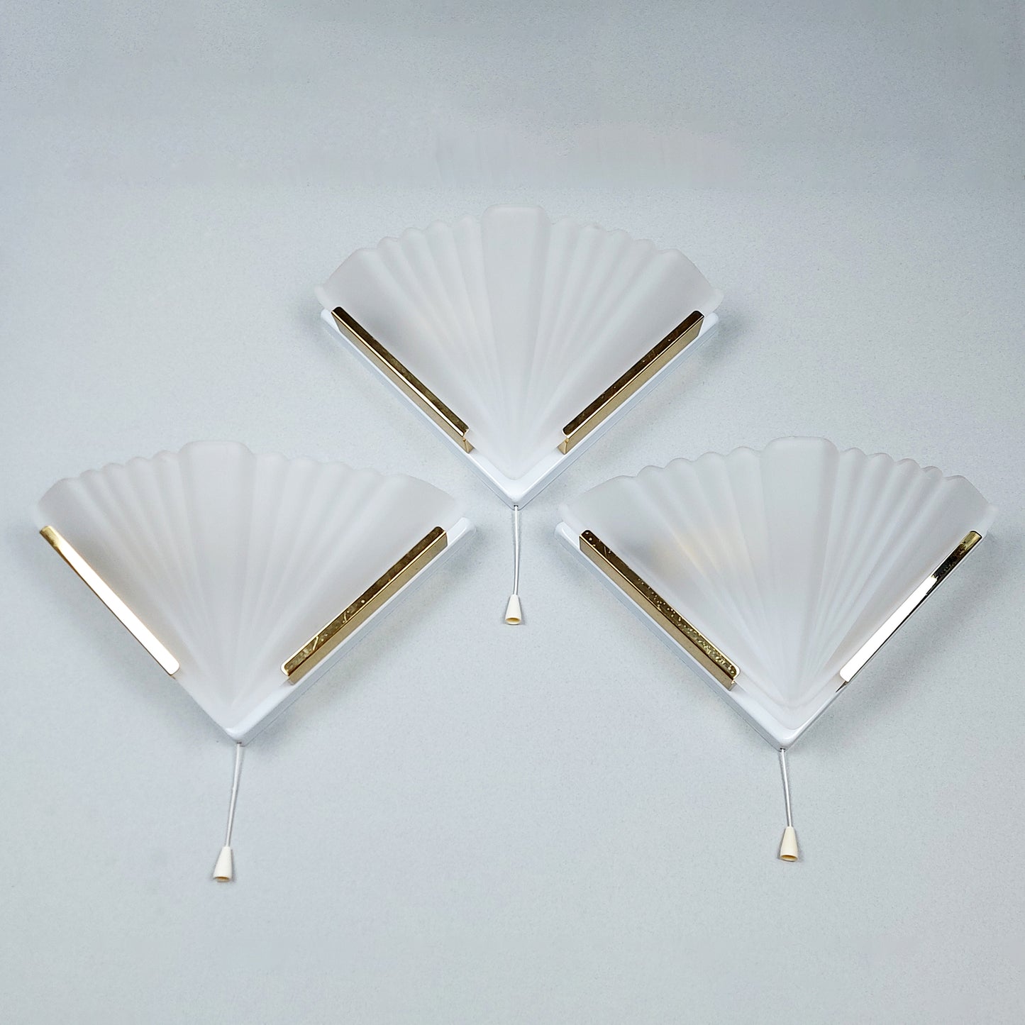 Set of 3 1980s art deco inspired sconces with frosted glass shades and polished brass accessories - Retro Lamp Shop