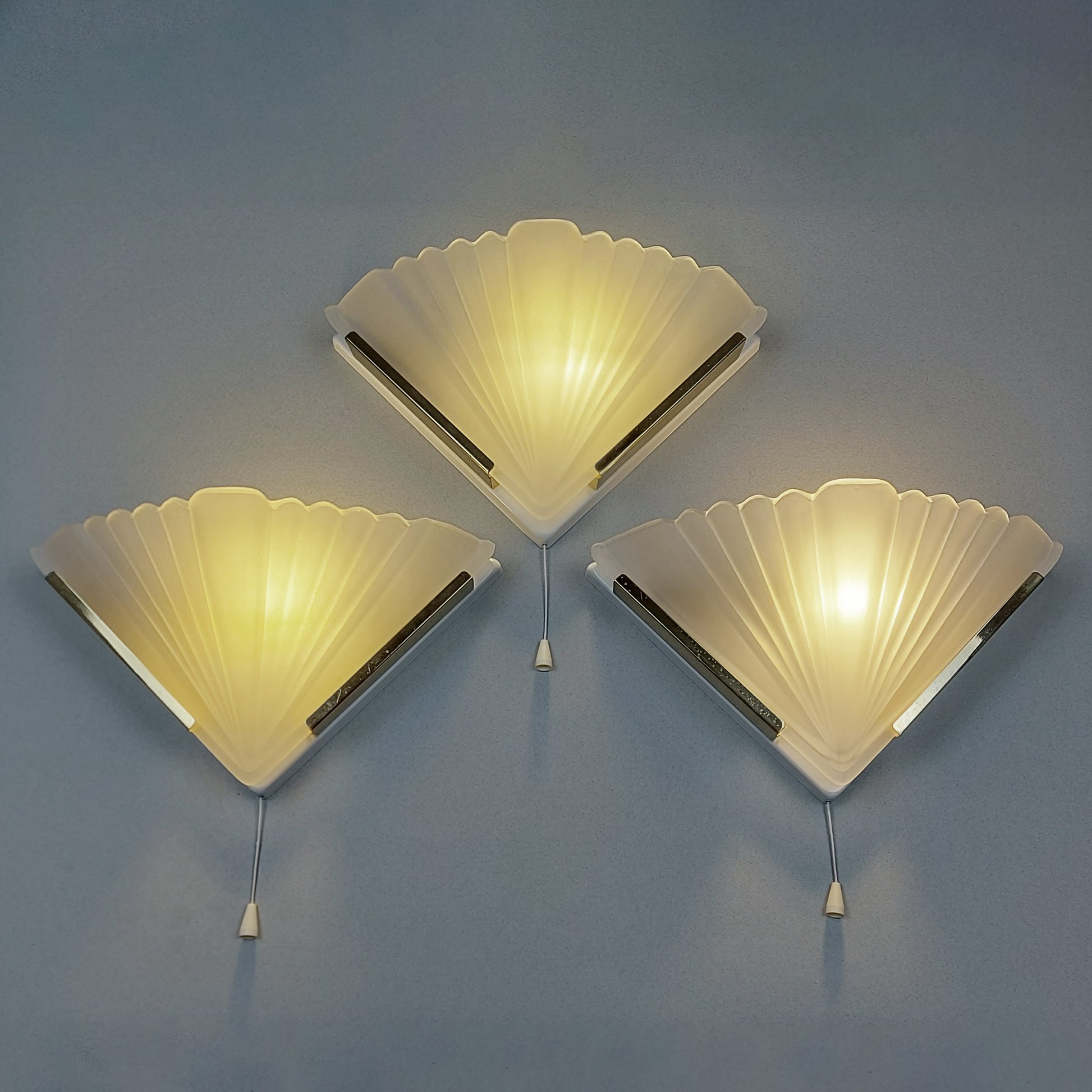Set of 3 1980s art deco inspired sconces with frosted glass shades and polished brass accessories - Retro Lamp Shop