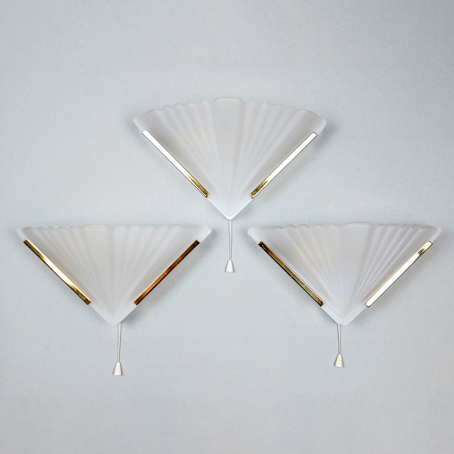 Set of 3 1980s art deco inspired sconces with frosted glass shades and polished brass accessories - Retro Lamp Shop