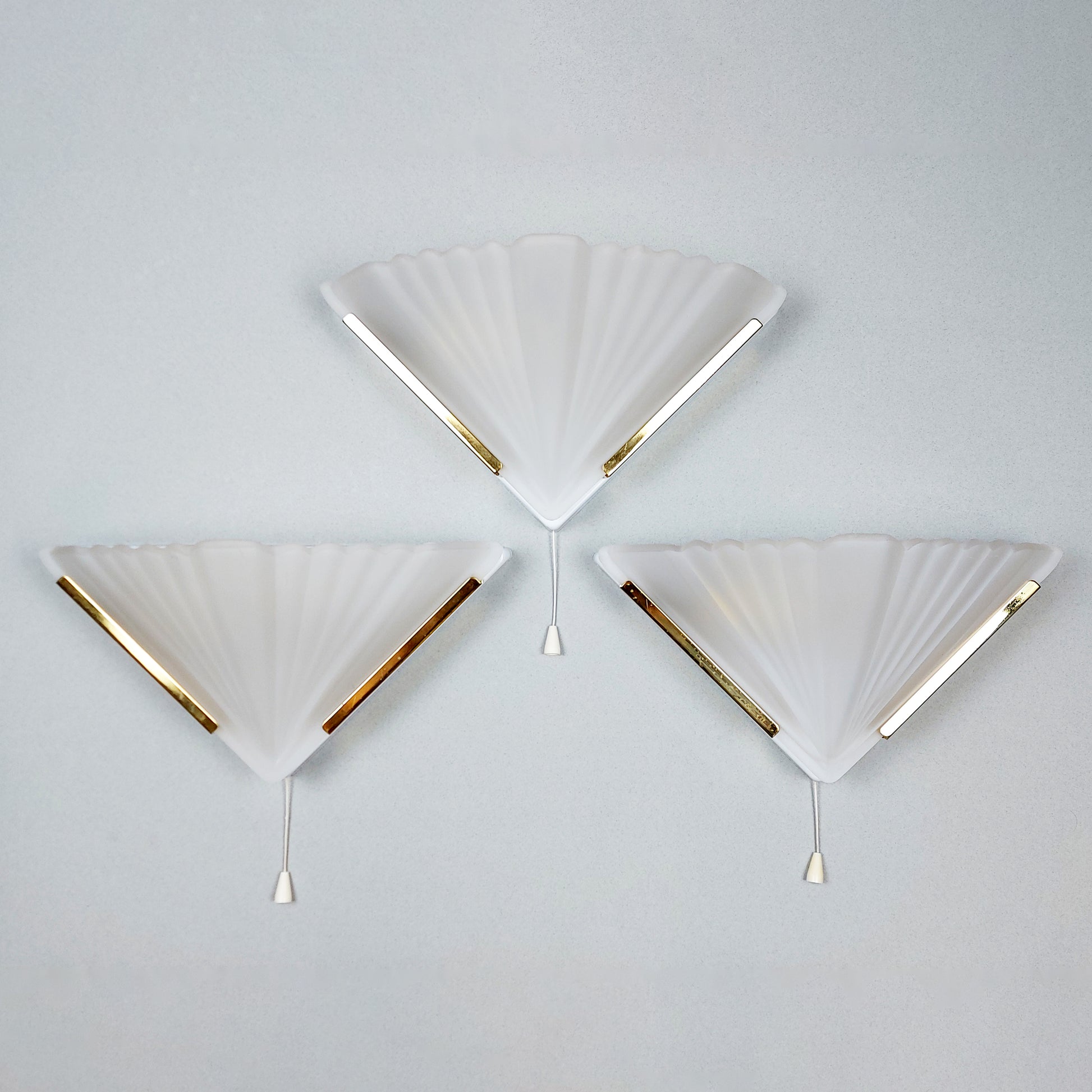 Set of 3 1980s art deco inspired sconces with frosted glass shades and polished brass accessories - Retro Lamp Shop