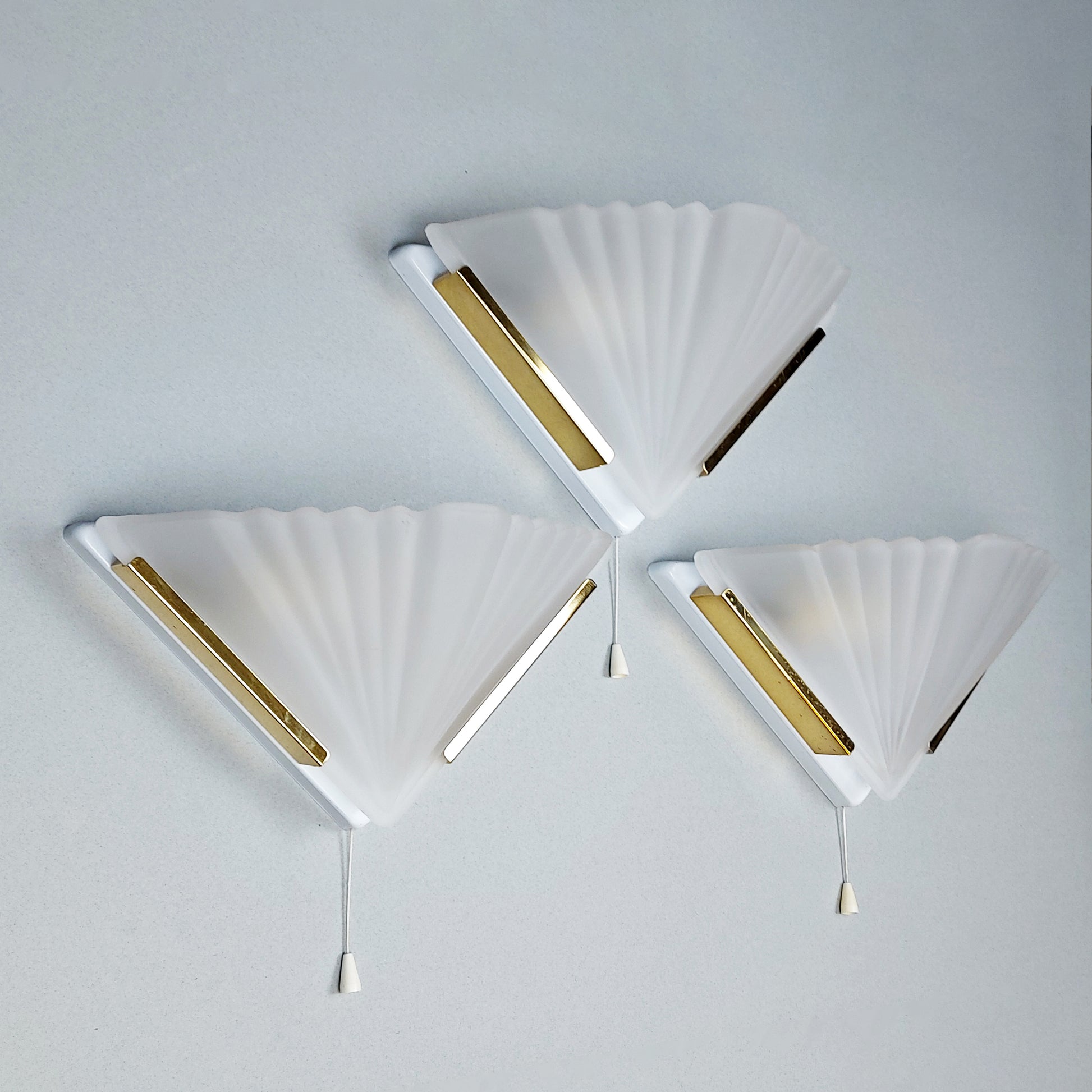 Set of 3 1980s art deco inspired sconces with frosted glass shades and polished brass accessories - Retro Lamp Shop