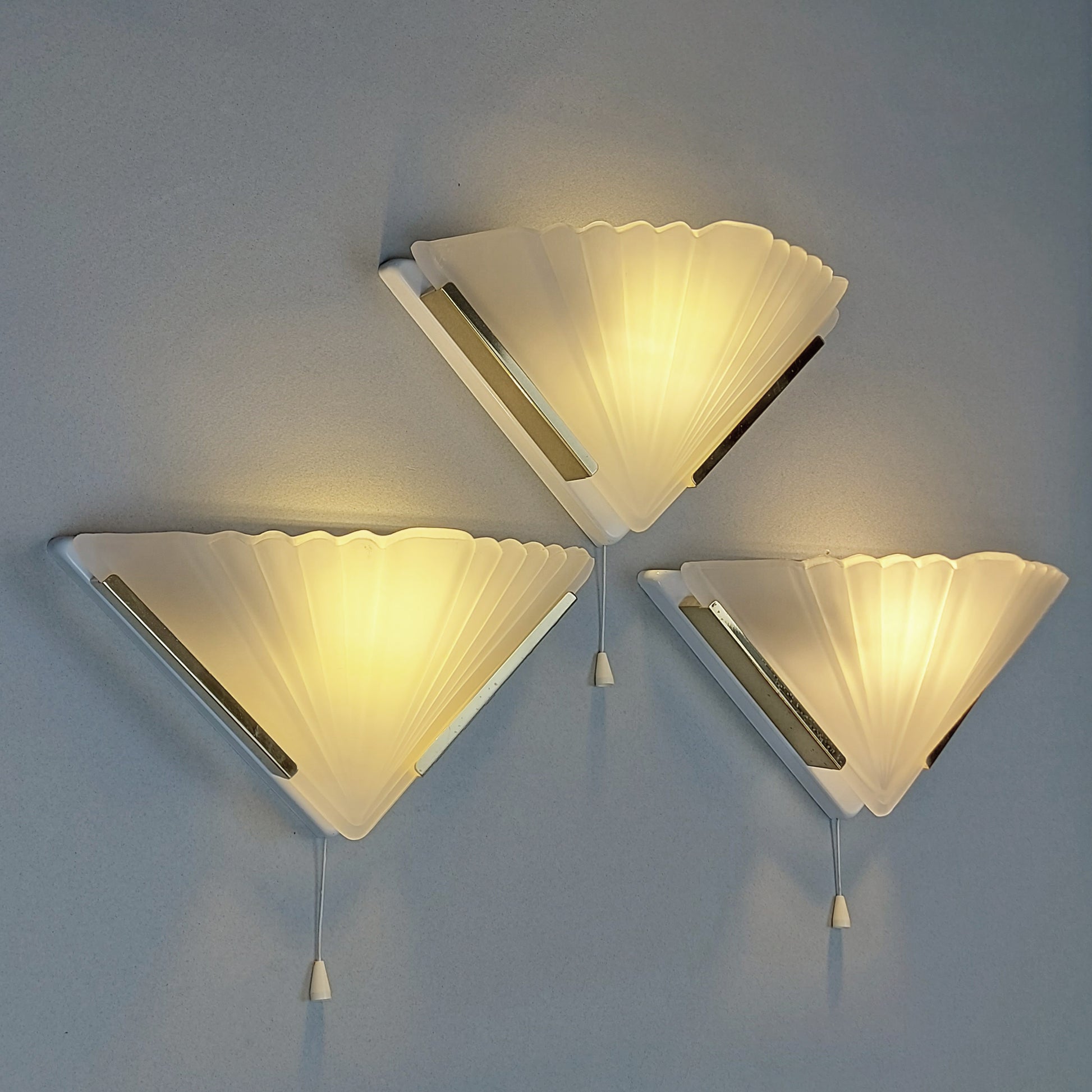 Set of 3 1980s art deco inspired sconces with frosted glass shades and polished brass accessories - Retro Lamp Shop