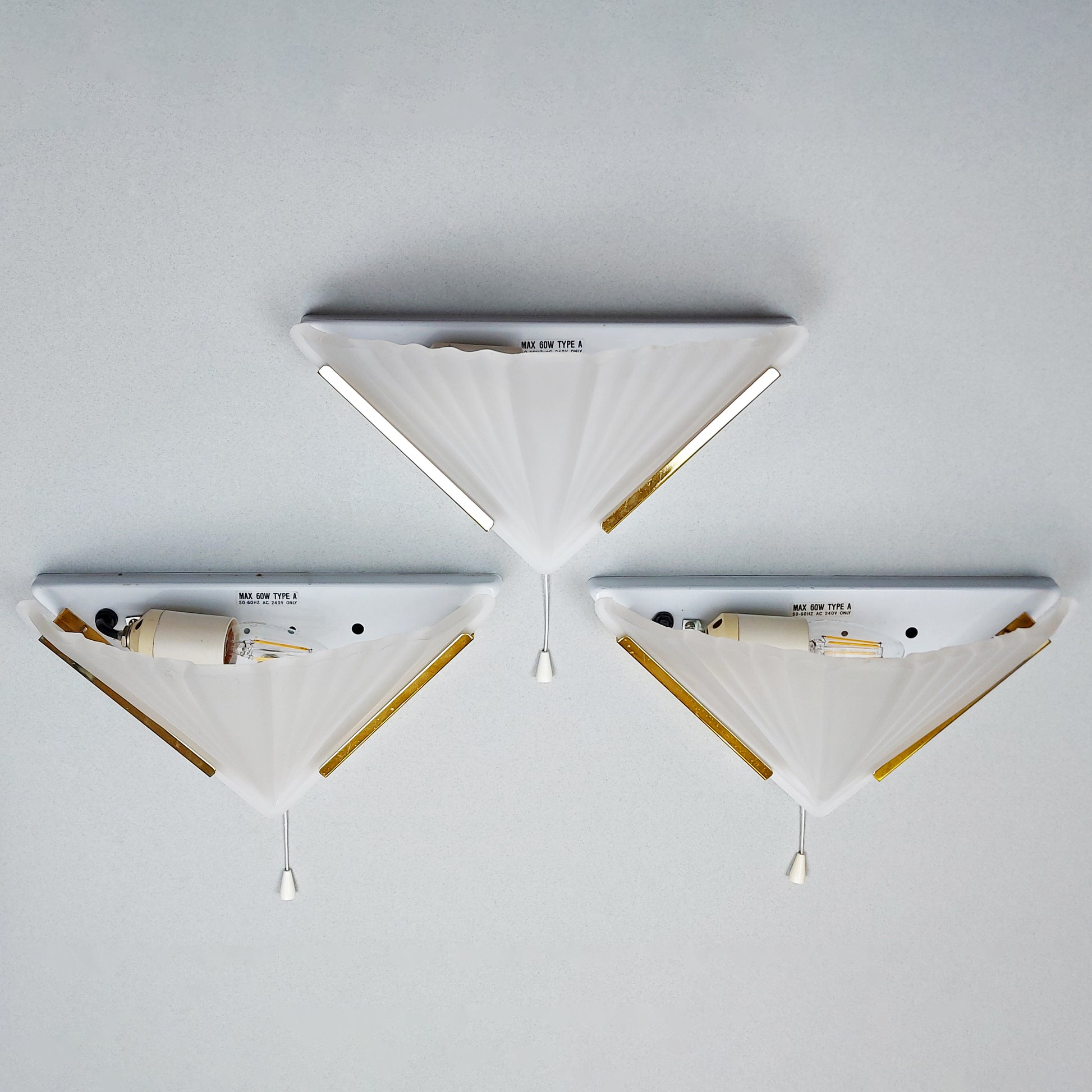 Set of 3 1980s art deco inspired sconces with frosted glass shades and polished brass accessories - Retro Lamp Shop