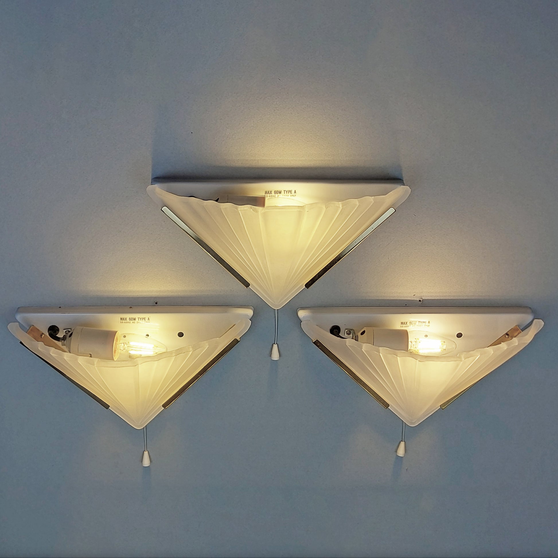 Set of 3 1980s art deco inspired sconces with frosted glass shades and polished brass accessories - Retro Lamp Shop