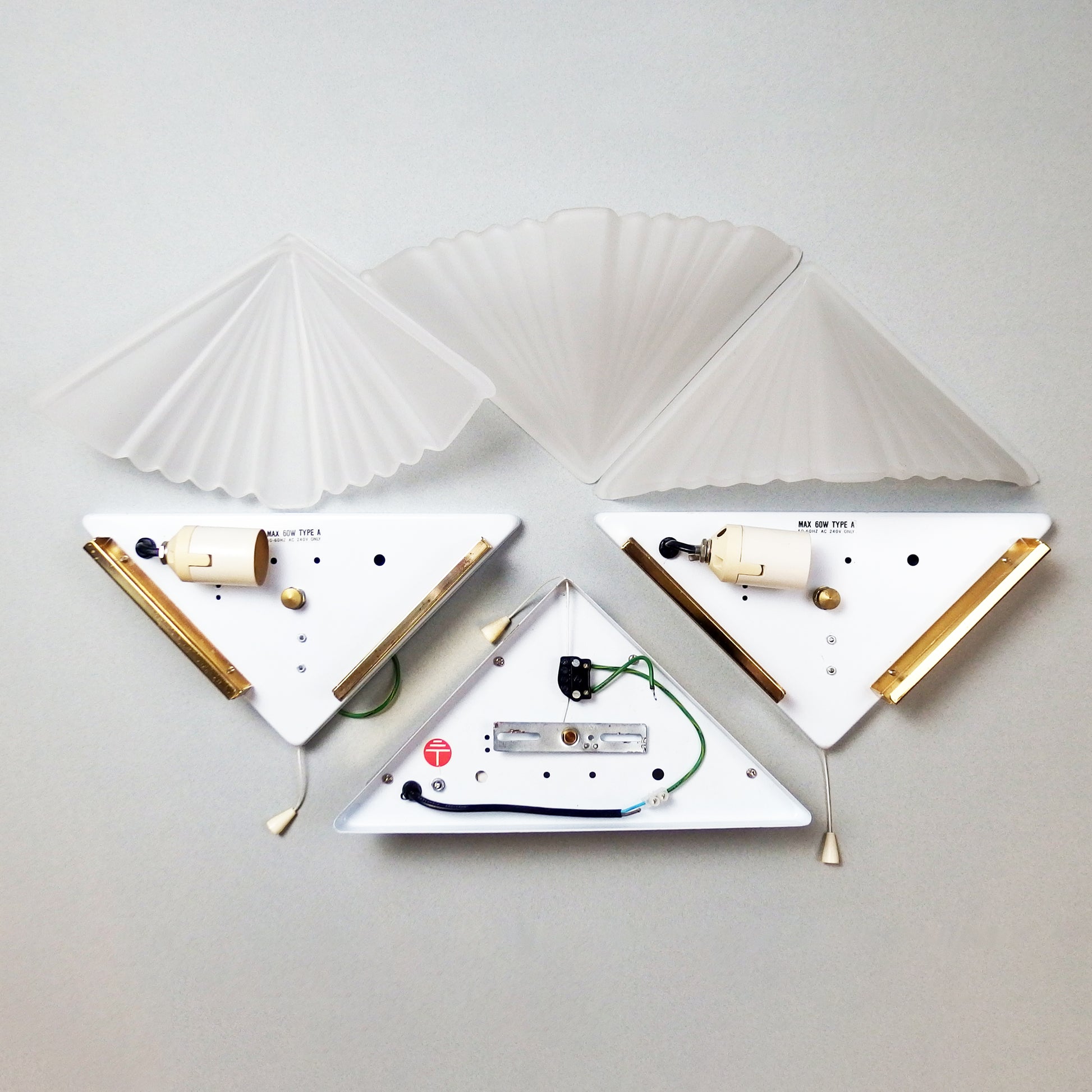 Set of 3 1980s art deco inspired sconces with frosted glass shades and polished brass accessories - Retro Lamp Shop