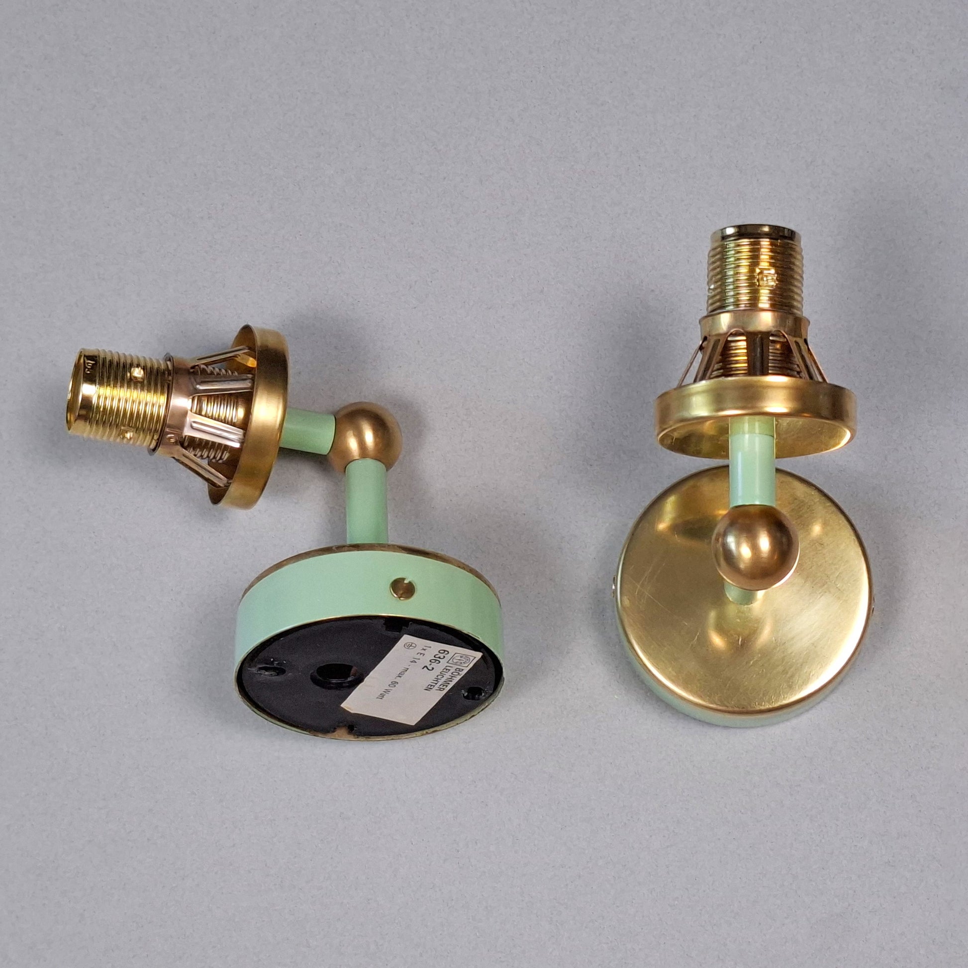 This is a pair of 1980s brass sconces with mint green accents and white frosted opaline shades - Retro Lamp Shop -
