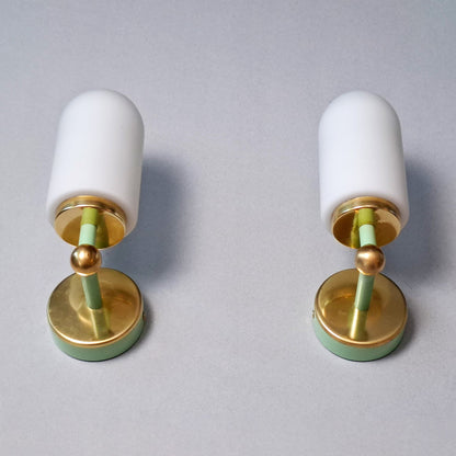 This is a pair of 1980s brass sconces with mint green accents and white frosted opaline shades - Retro Lamp Shop -