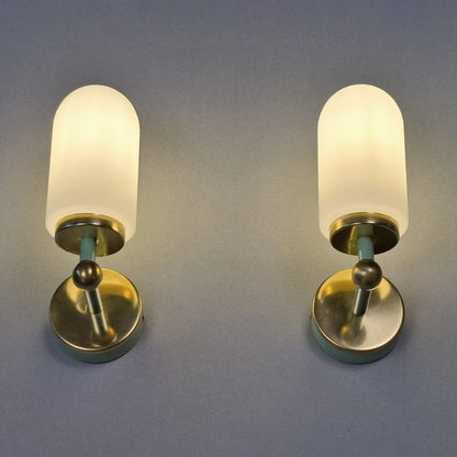 This is a pair of 1980s brass sconces with mint green accents and white frosted opaline shades - Retro Lamp Shop -