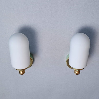 This is a pair of 1980s brass sconces with mint green accents and white frosted opaline shades - Retro Lamp Shop -