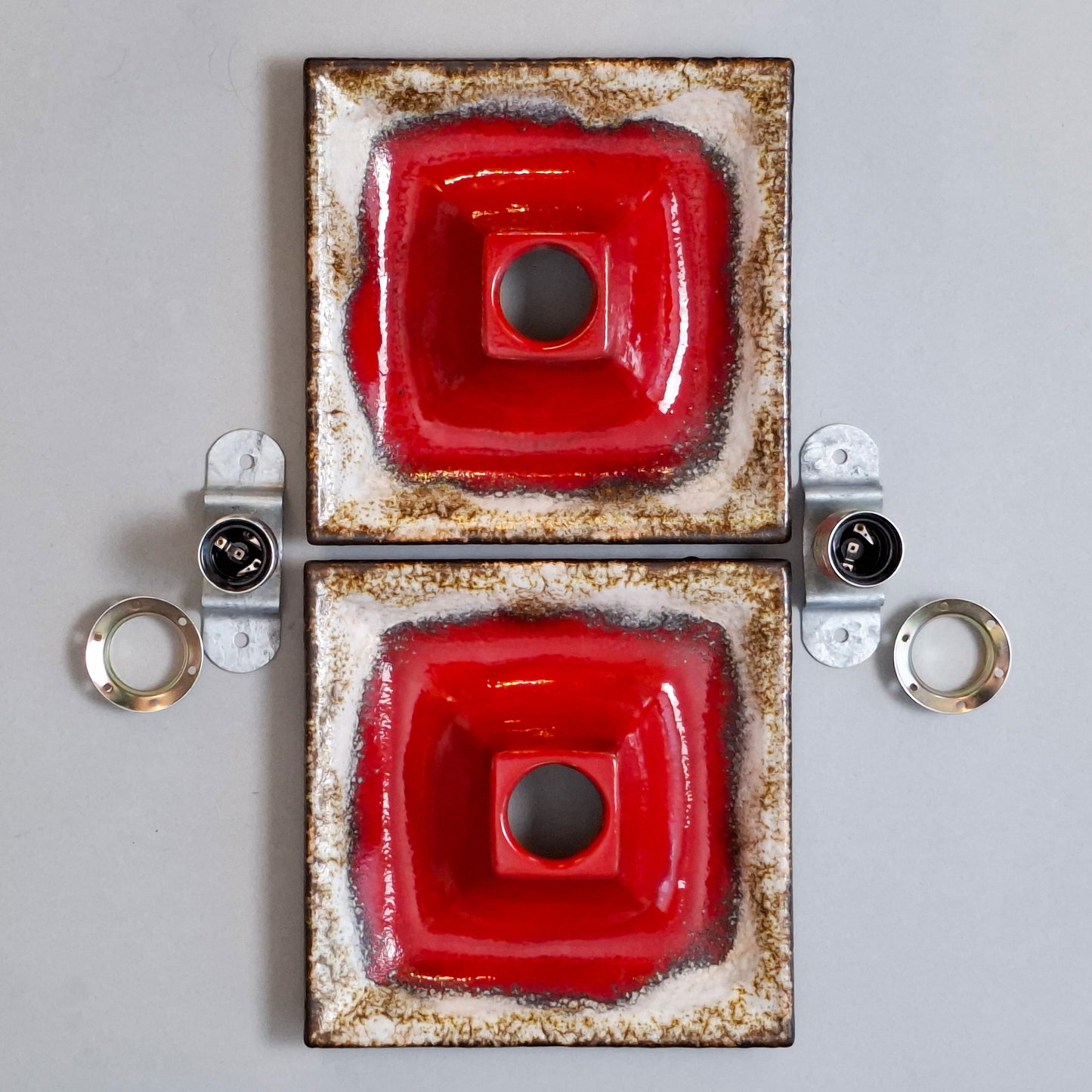 Pair of 1970's fat lava red ceramic sconces from Hustadt