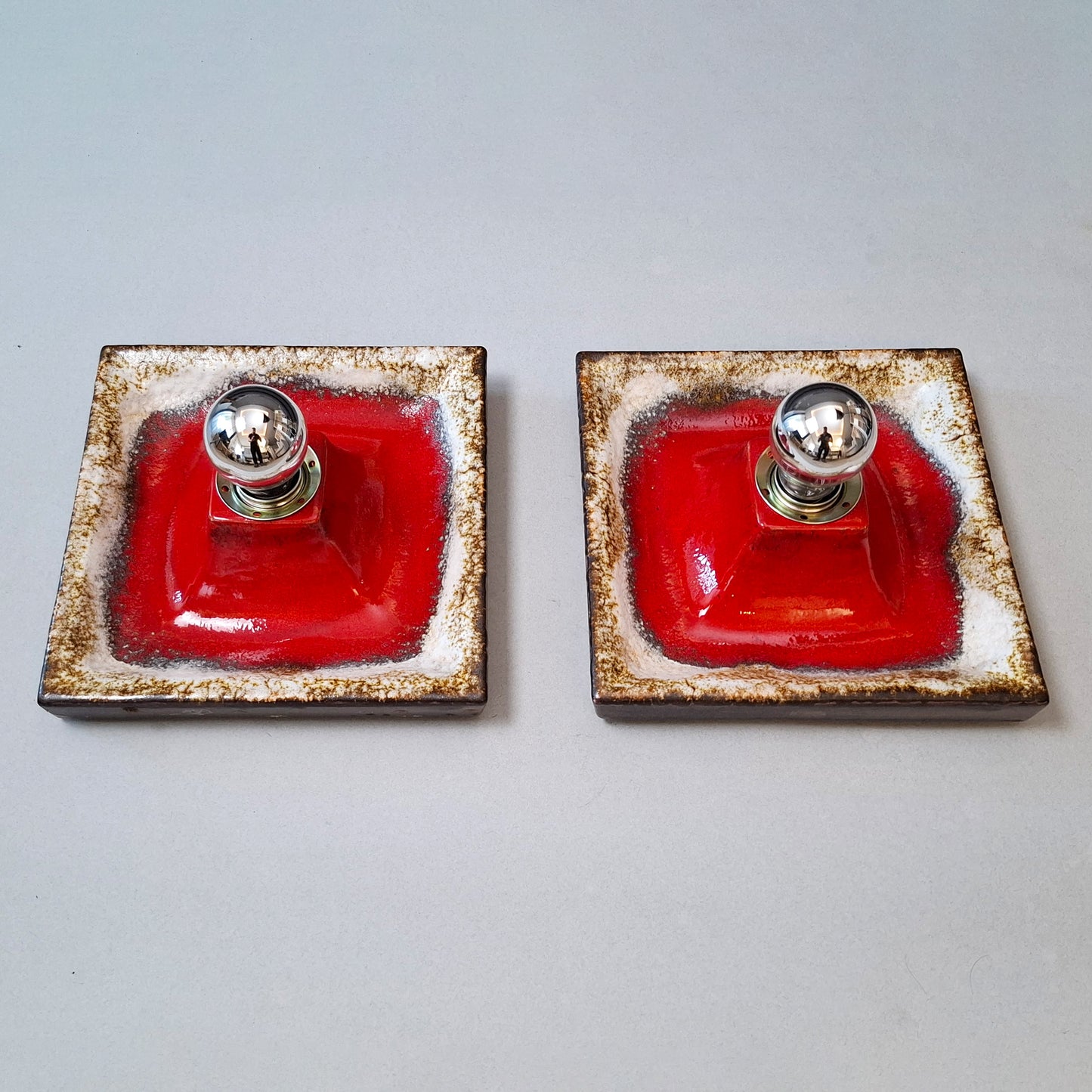 Pair of 1970's fat lava red ceramic sconces from Hustadt