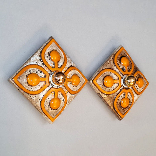 This is a pair  of 70's fat lava orange ceramic  sconces - Retro Lamp Shops