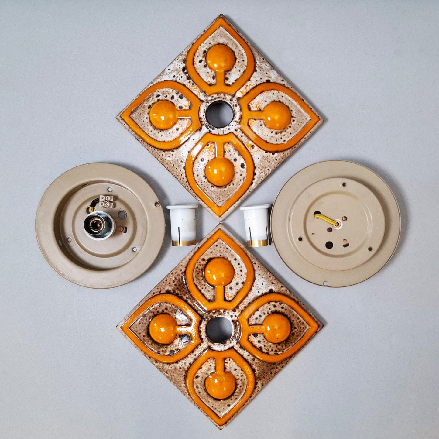 This is a pair  of 70's fat lava orange ceramic  sconces - Retro Lamp Shops