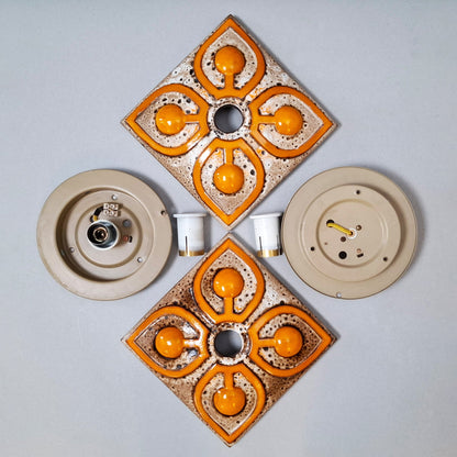 This is a pair  of 70's fat lava orange ceramic  sconces - Retro Lamp Shops