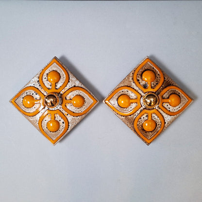 This is a pair  of 70's fat lava orange ceramic  sconces - Retro Lamp Shops