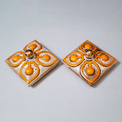 This is a pair  of 70's fat lava orange ceramic  sconces - Retro Lamp Shops
