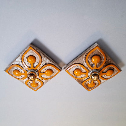 This is a pair  of 70's fat lava orange ceramic  sconces - Retro Lamp Shops