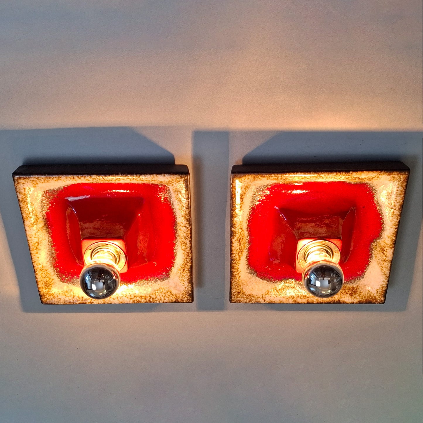 Pair of 1970's fat lava red ceramic sconces from Hustadt