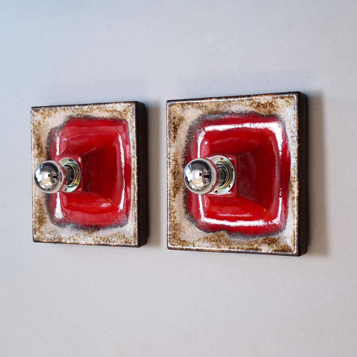 This is a pair of 1970's pop art fat lava red ceramic sconces from Hustadt - Retro Lamp Shop